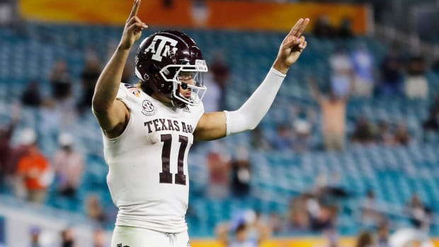 Kellen Mond #11 of the Texas A&M Aggies celebrates after a touchdown. He is a 2021 NFL Draft prospect.