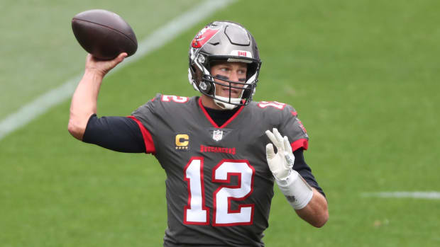 Tom Brady attempts a pass for the Buccaneers.