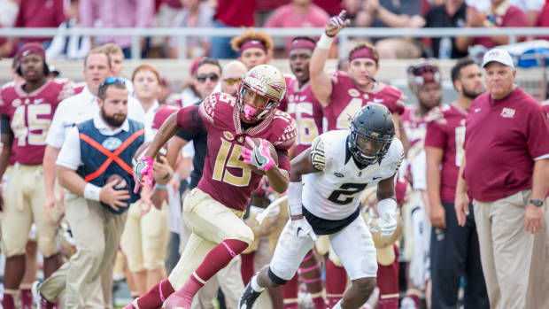 Florida State wide receiver Travis Rudolph runs with the ball.