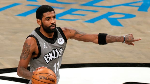 Kyrie Irving dribbling for the Nets.