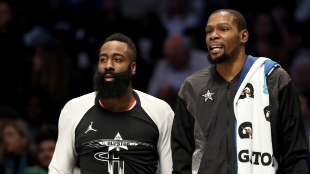 Brooklyn Nets stars Kevin Durant and James Harden stand together.