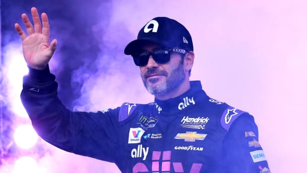 NASCAR great Jimmie Johnson waves. The new IndyCar driver will be in studio for the Indy 500 this month.