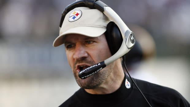 Former Pittsburgh Steelers head coach Bill Cowher on the field.