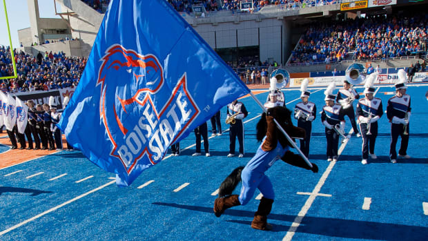 Boise State's mascot running onto the field.