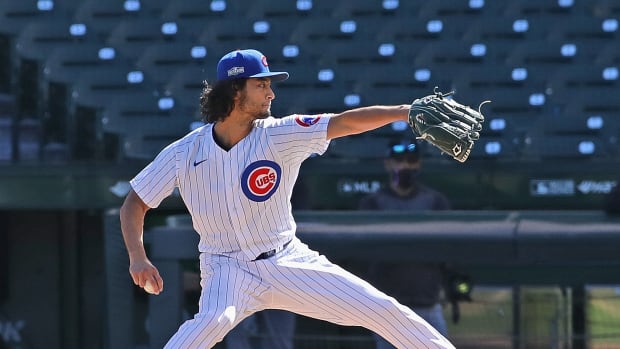 Starting pitcher Yu Darvish #11 of the Chicago Cubs throws the ball to the plate