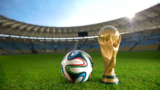 A generic photo of the World Cup trophy and official ball.