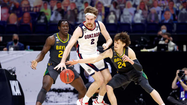 Matthew Mayer #24 of the Baylor Bears attempts to steal the ball from Drew Timme #2 of the Gonzaga Bulldogs in the National Championship game of the 2021 NCAA Men's Basketball Tournament