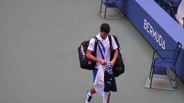 Novak Djokovic leaves the U.S. Open.