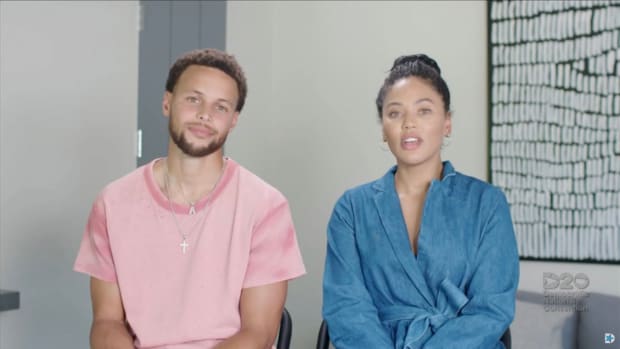 Ayesha Curry and Steph Curry on television.
