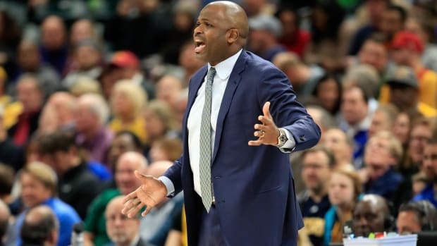 A closeup of Nate McMillan during an Indiana Pacers game.