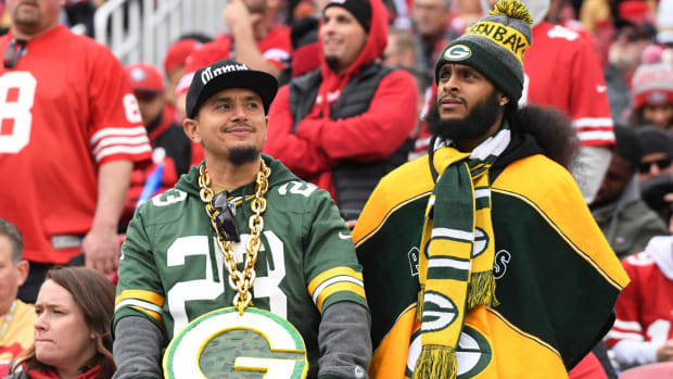 Disappointed Green Bay Packers fans during NFL playoff blowout loss to the San Francisco 49ers.