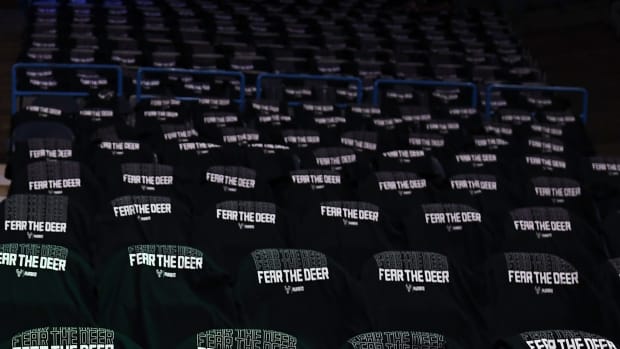 Milwaukee Bucks playoff t-shirts sitting on empty seats.