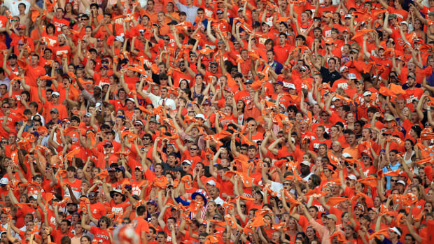 A view of Clemson fans cheering.
