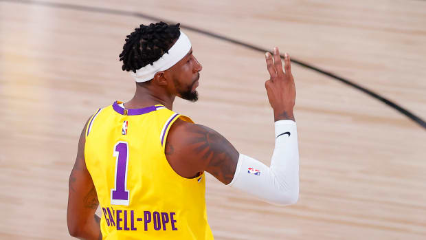 Kentavious Caldwell-Pope #1 of the Los Angeles Lakers reacts to his three point basket