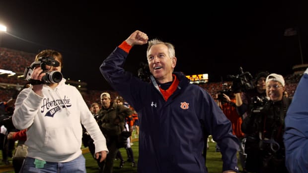 Tommy Tuberville celebrates after a win.
