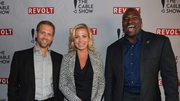 ESPN's Max Kellerman, Michelle Beadle, and Marcellus Wiley at an event.