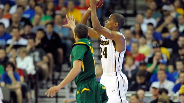 Missouri's Kim English takes a shot over a Norfolk State player.