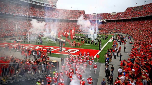 A general view of Ohio State's stadium as players run onto the field.