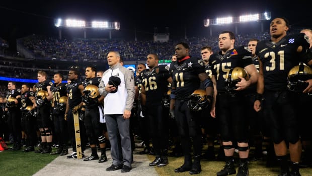The Army Black Knights standing during the National Anthem ahead of the Army-Navy Game in 2014.