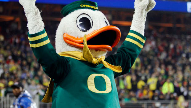 The Oregon duck signals to the crowd.