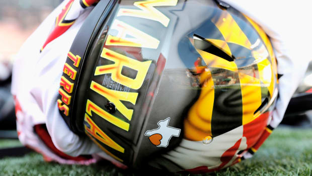 A closeup of a Maryland Terrapins football helmet.