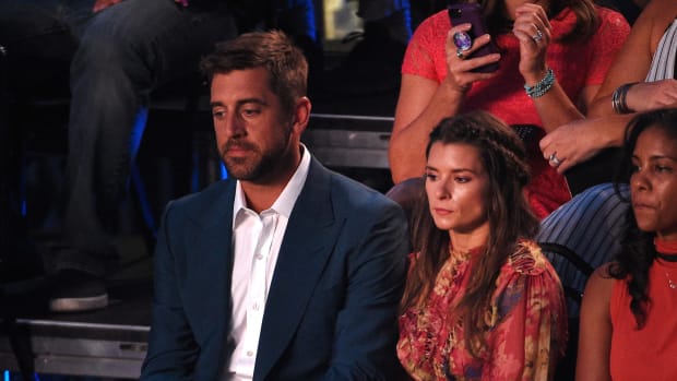 Aaron Rodgers and Danica Patrick at an awards show.