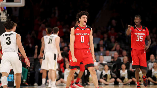 Geo Baker #0 of the Rutgers Scarlet Knights celebrates
