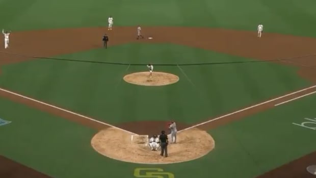 Joey Votto stealing third base.