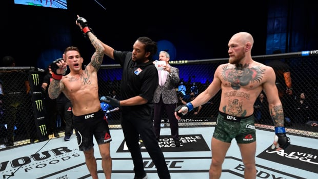 Dustin Poirier reacts after his knockout victory over Conor McGregor