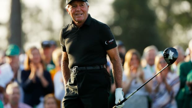 Gary Player reacting to a shot during a tournament.