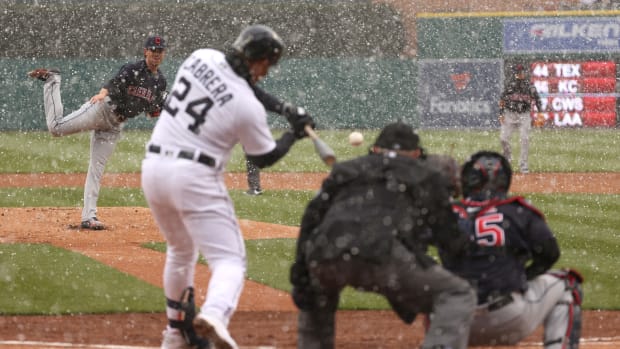 Miguel Cabrera crushes a home run in the snow.
