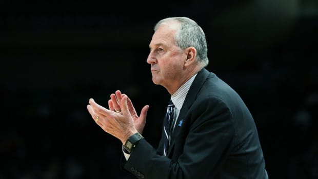 Jim Calhoun on the Connecticut Huskies sideline during a game.