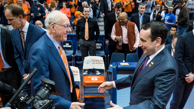 Legendary college basketball coaches Jim Boeheim and Mike Krzyzewski ahead of an ACC Syracuse vs. Duke game. Both coaches have won the NCAA Tournament in their careers.