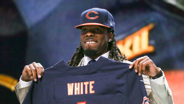 Kevin White holds up his Chicago Bears jersey.