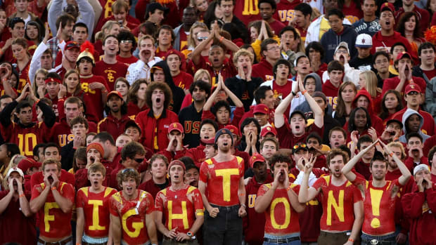 USC Trojans fans cheer in the game against the Washington State Cougars.