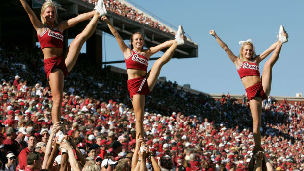 Cheerleaders of the Oklahoma Sooners perform during the game against the Texas A&M Aggies.