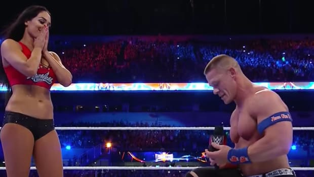 John Cena proposes to Nikki Bella at Wrestlemania.