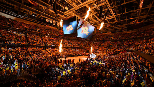 A general view of the Cleveland Cavaliers home court as fire is sprayed into the air.
