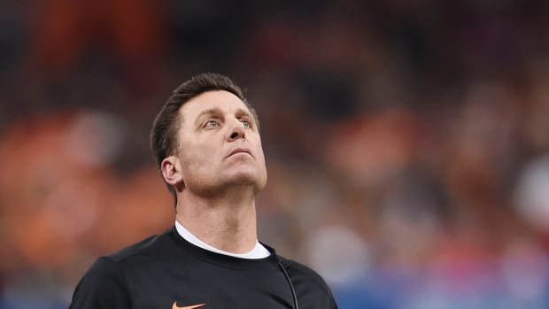 Mike Gundy looks up at the scoreboard during the Sugar Bowl.