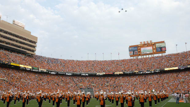Tennessee band members performing on the field