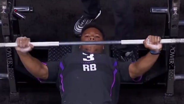 Saquon Barkley benches during NFL Combine.