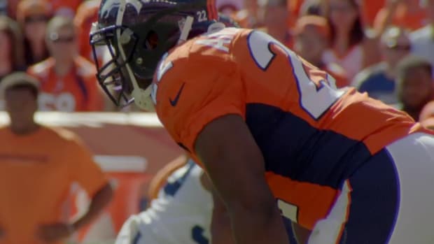 C.J. Anderson in the Broncos backfield before taking a snap.