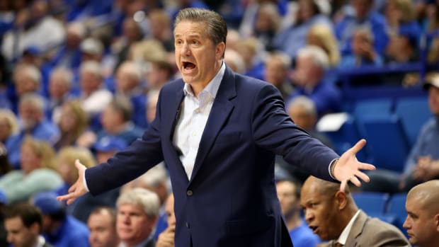 Coach Cal yelling from the Kentucky sideline.