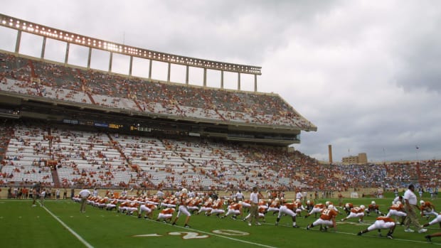 The Texas Longhorns football team warming up before a game.