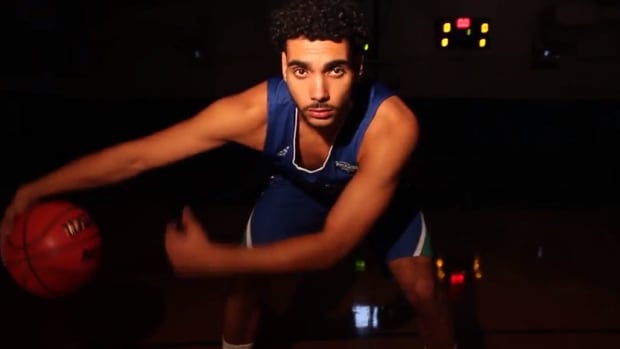 Ehab Amin dribbles in a promo video for Texas A&M-Corpus Christi basketball.