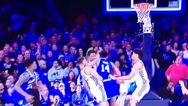 Seton Hall player comes down with an elbow on Kentucky basketball's PJ Washington.