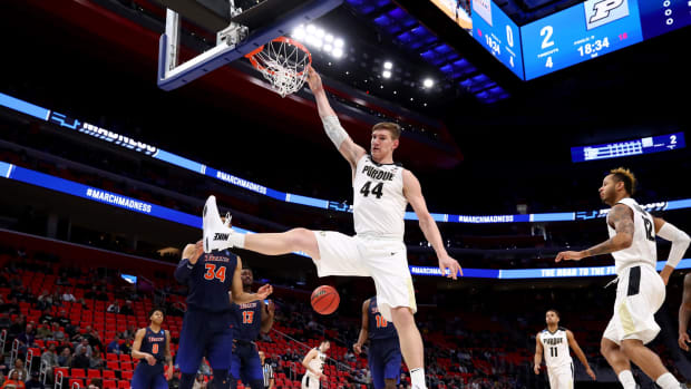 Isaac Haas dunking the ball.