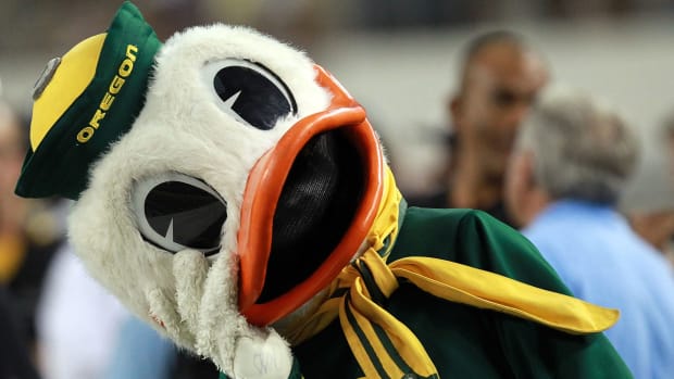 Oregon's mascot staring at something on the sideline.