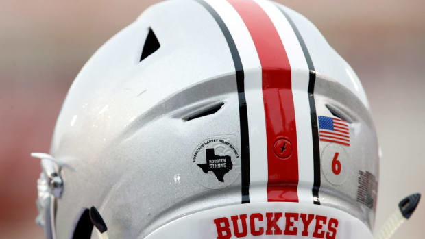 A closeup of an Ohio State buckeyes football helmet.