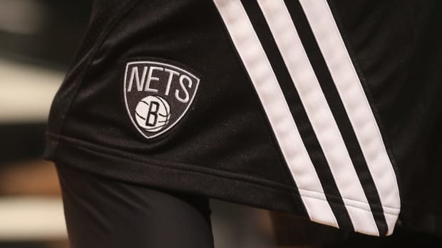 A closeup of Brooklyn Nets shorts.